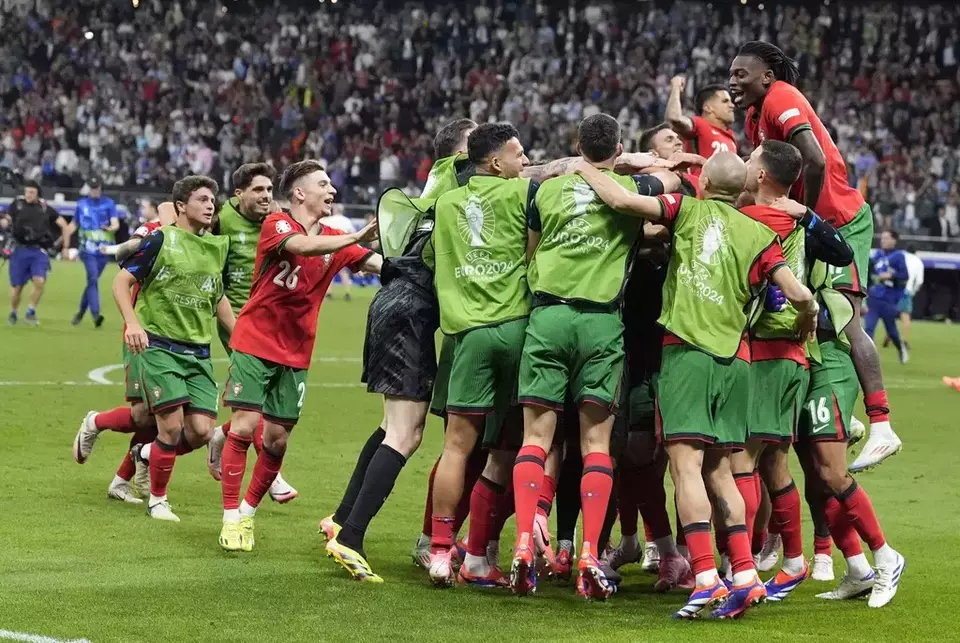 Selebrasi pemain Portugal seusai menaklukkan Slovenia di babak 16 besar Euro 2024.